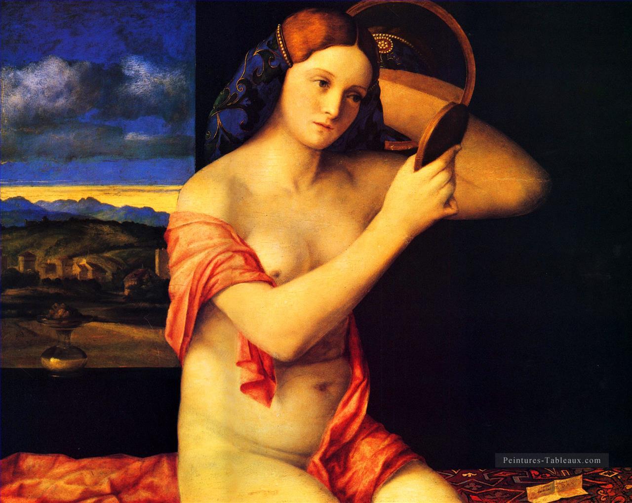 Dame à sa toilette Renaissance Giovanni Bellini Peintures à l'huile